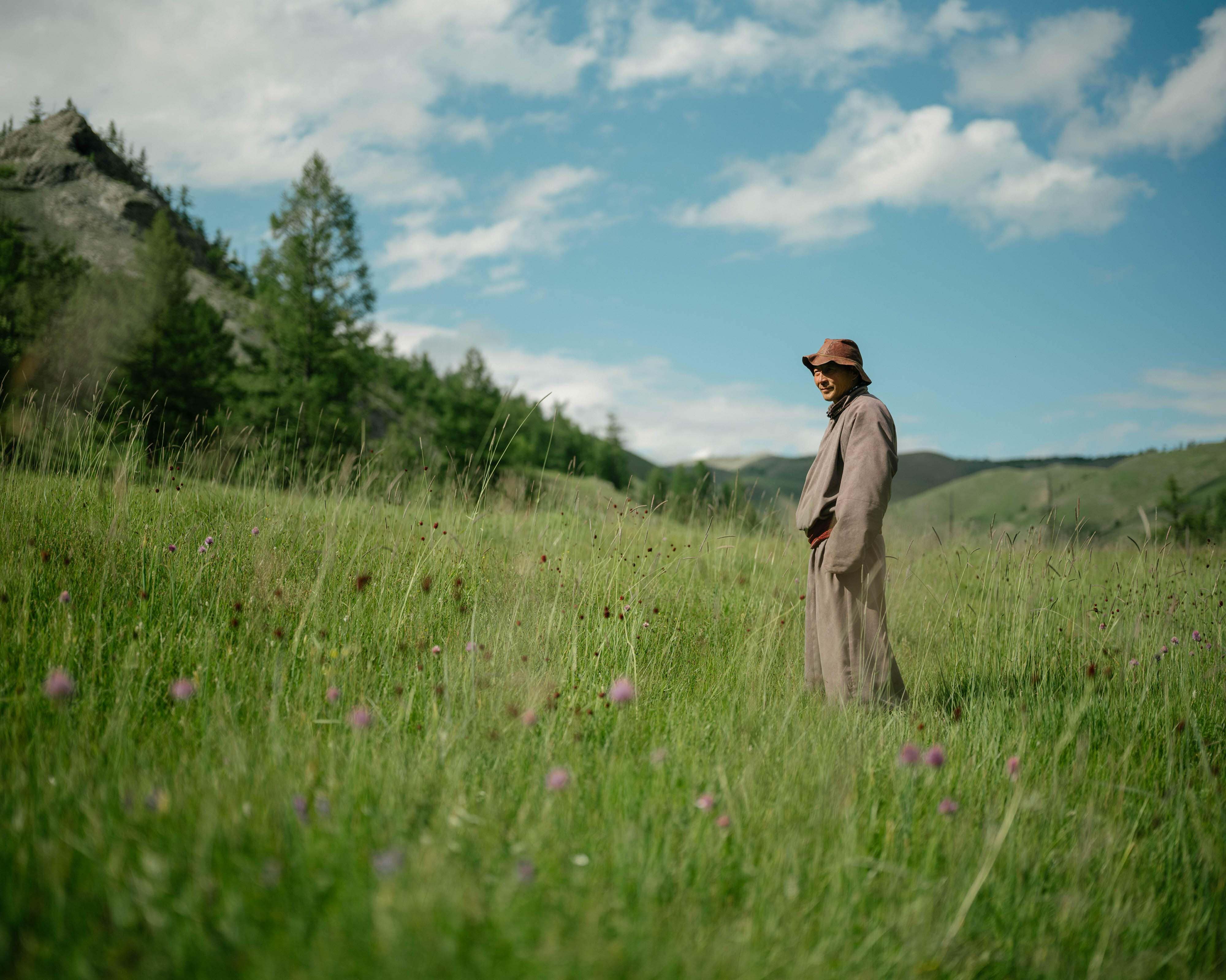 A person standing in a field.