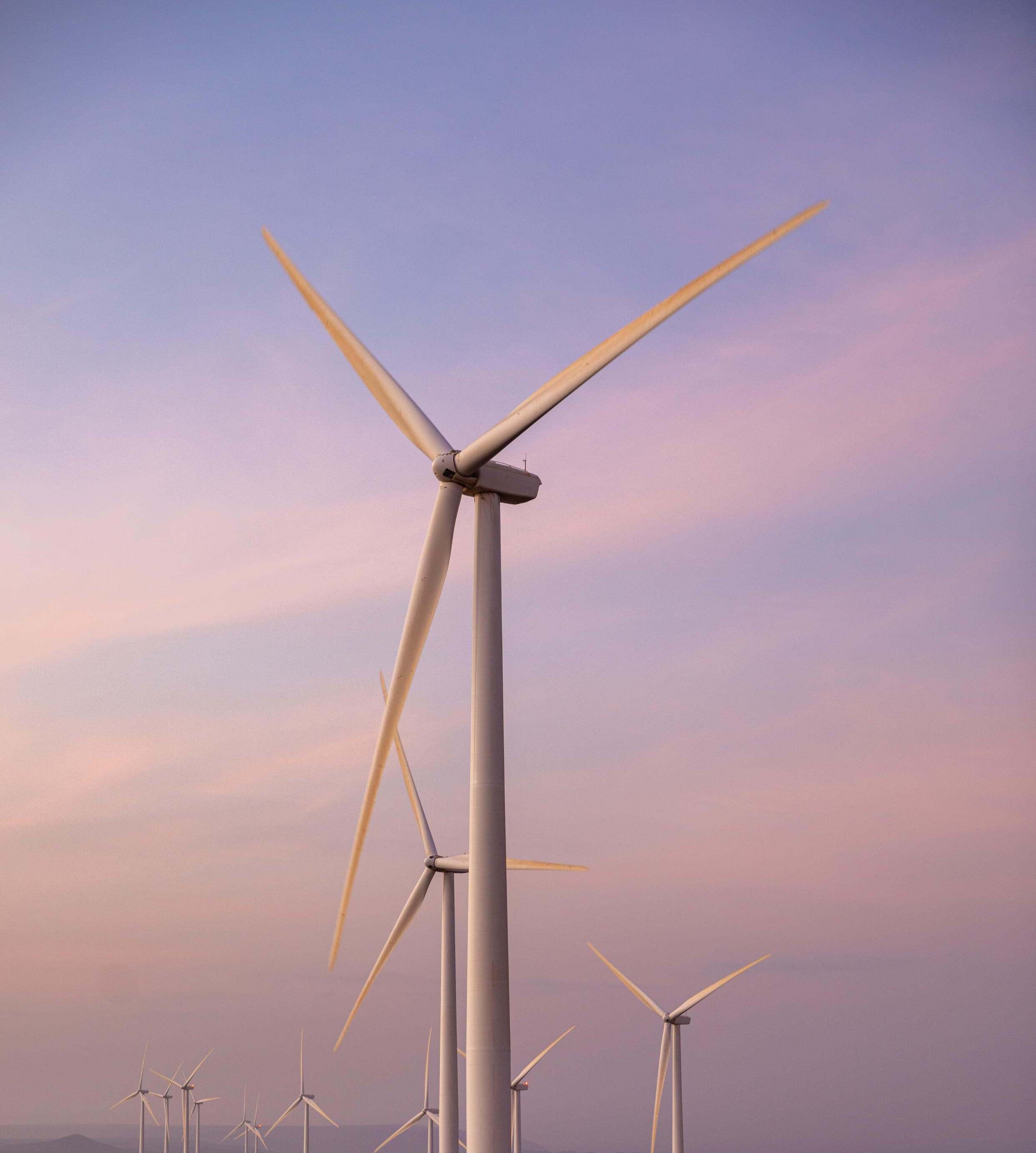 Wind turbine at sunset.