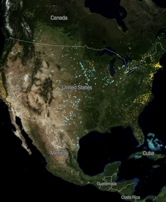 Satellite image depicting solar and wind installations.