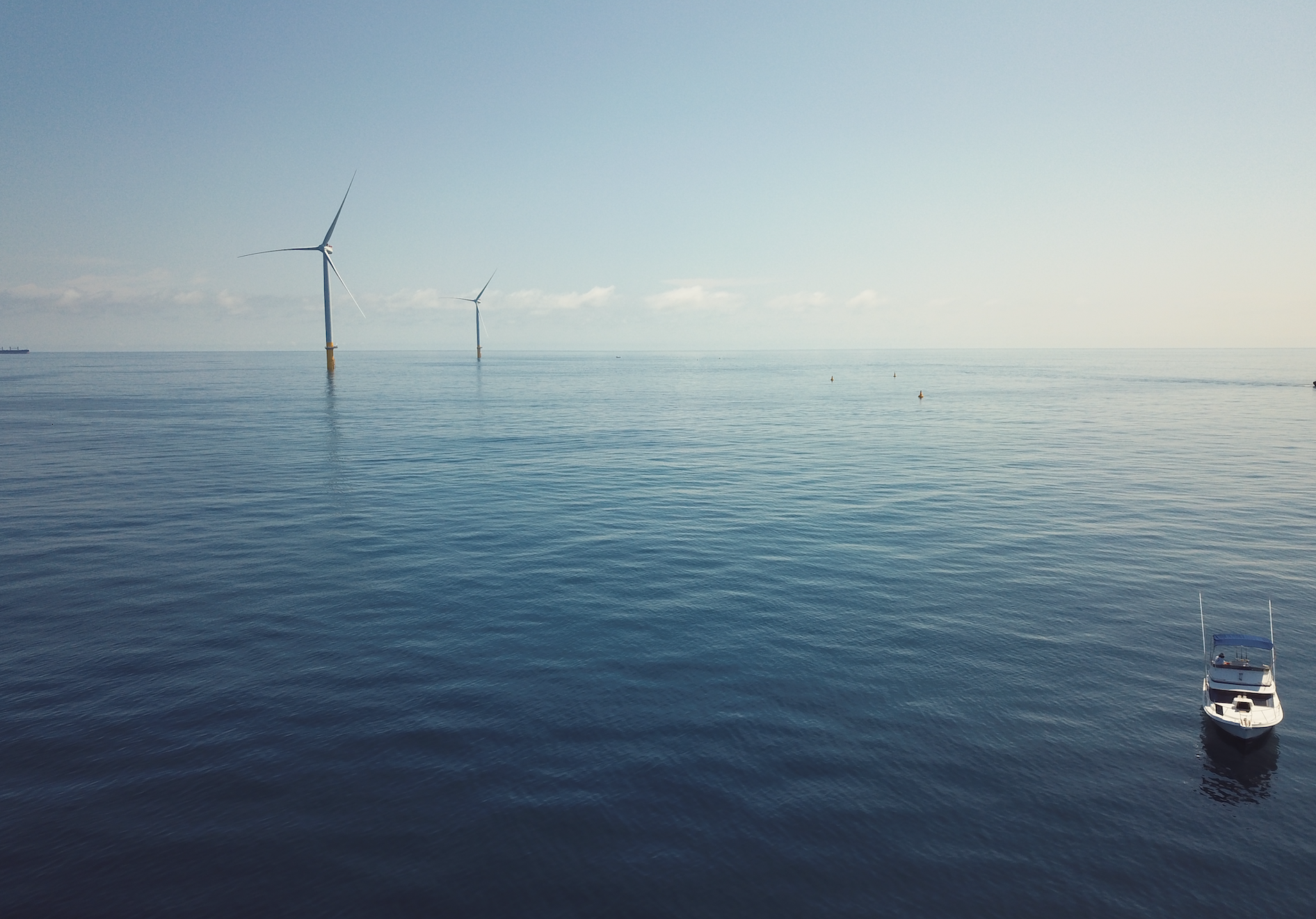 sea with wind turbines.